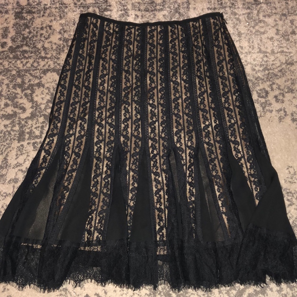 Great black lace skirt with gold underlay